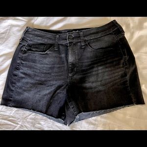 Black denim cut off shorts.